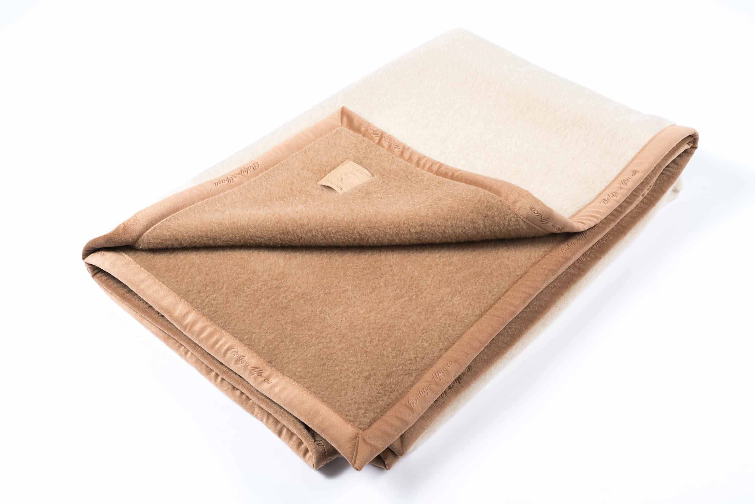 Gefaltete Suri Baby Alpakadecke in creme/kamel