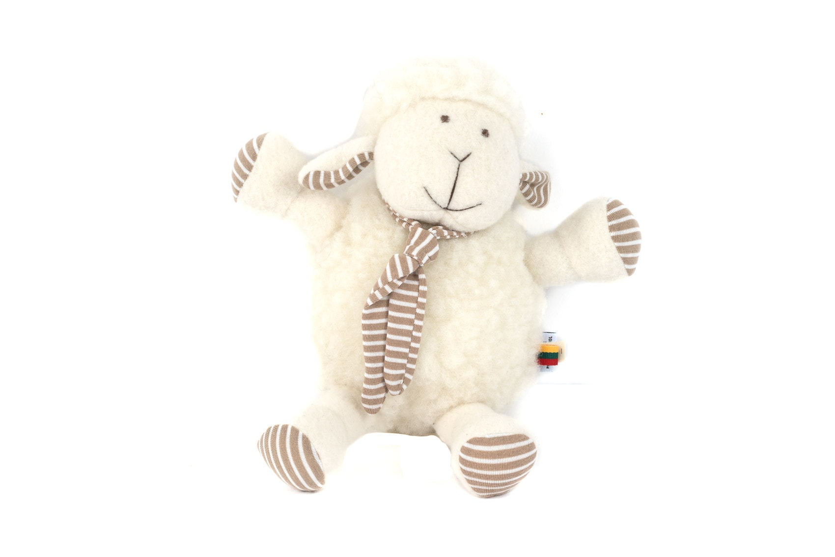 Plüschtier Schaf Floh vor weißem Hintergrund