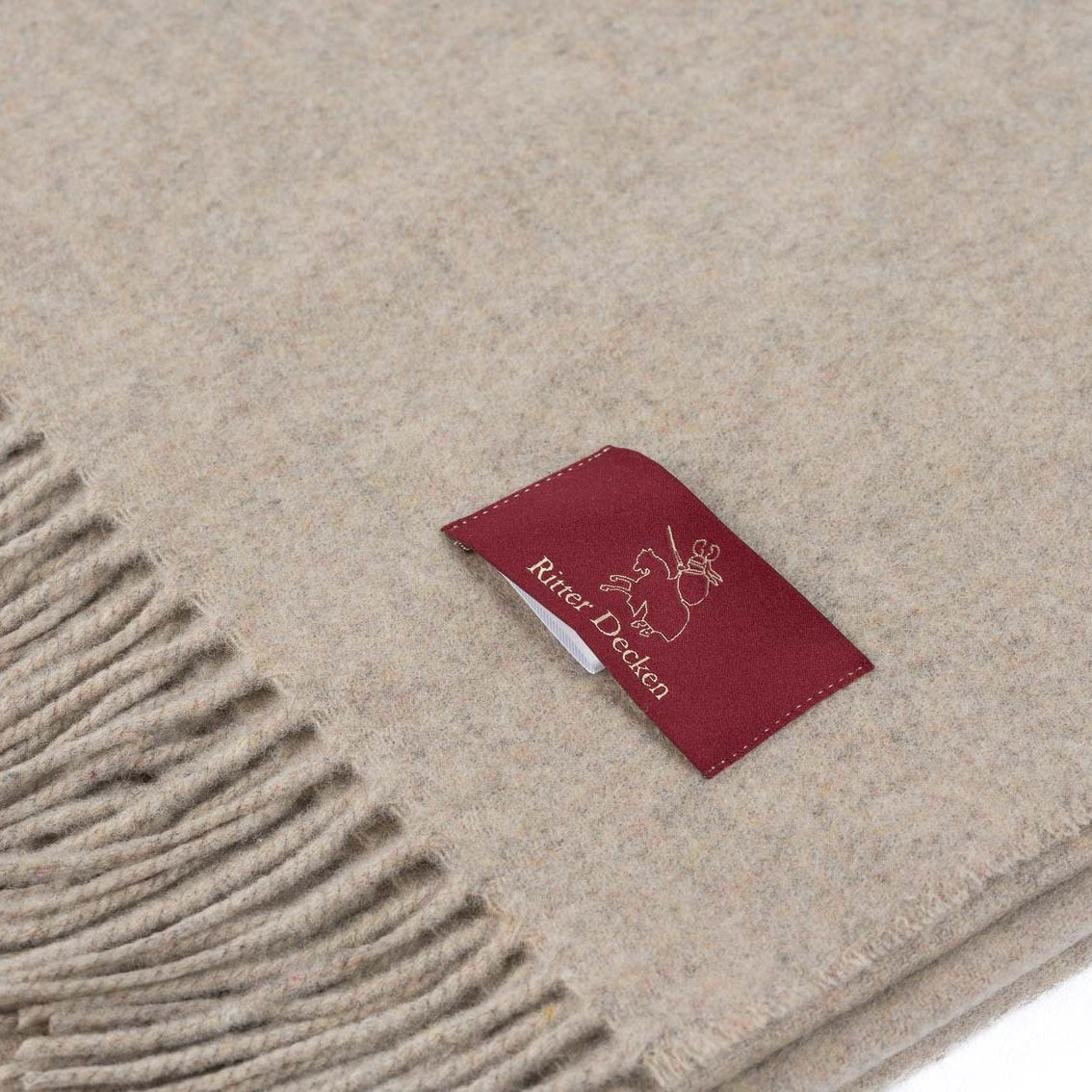 Luzern Schurwollplaid in hellbraun meliert in Detail