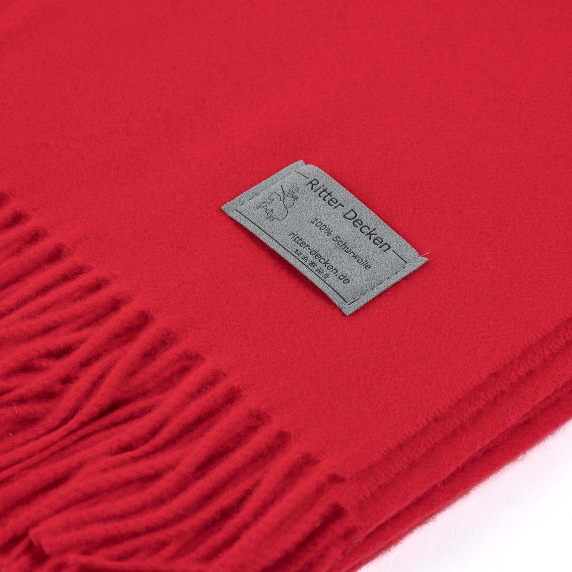 Luzern Schurwollplaid in rot im Detail